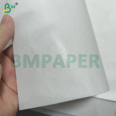 गैर चिपकने वाला वैक्स पेपर खाद्य ग्रेड रैप पेपर 25gsm ब्लीच्ड फूड लाइनर पेपर
