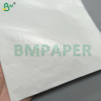गैर चिपकने वाला वैक्स पेपर खाद्य ग्रेड रैप पेपर 25gsm ब्लीच्ड फूड लाइनर पेपर