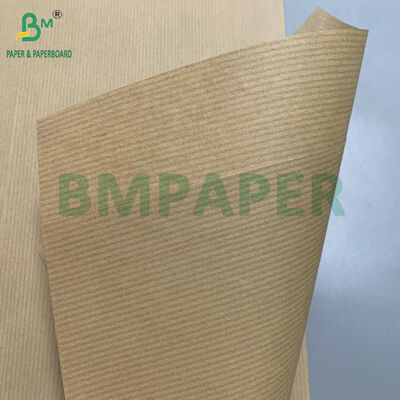 भारी ड्यूटी 24 ¢ x 200 ¢ रोल 70 ग्राम 80 ग्राम स्ट्रिप्ड क्राफ्ट पेपर फूल लपेटने के लिए शिपिंग सुरक्षात्मक पैकेजिंग